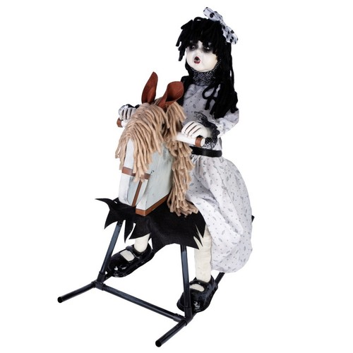 Böse puppe auf schaukelpferd - puppe,